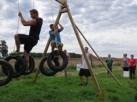 Skyliners try out the swinging tire obstacle