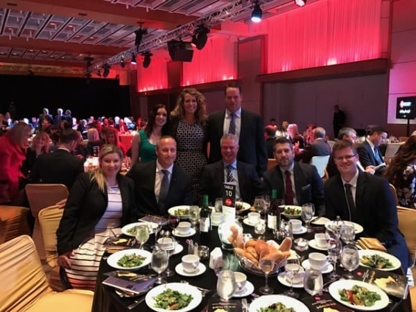 Executives attend the black tie dinner