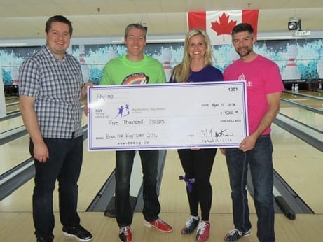 Cheque presentation for five thousand dollars to Big Brothers Big Sisters Guelph
