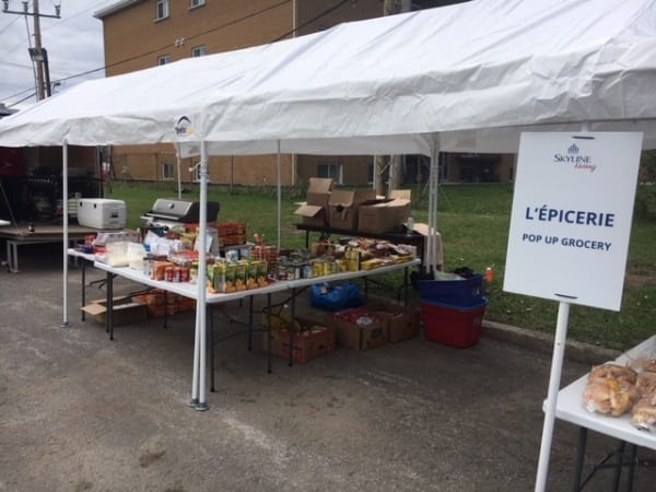 Snack station covered by a white tent