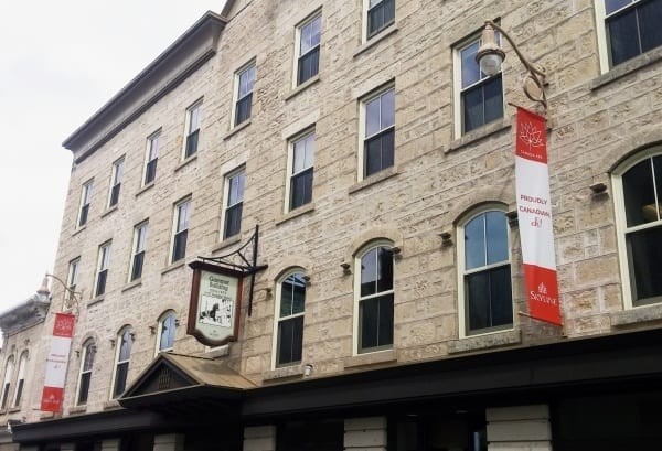 Canada banners drap across the front of Skyline's head office