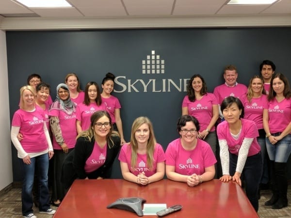 Skyline Commercial Management staff wear pink shirts