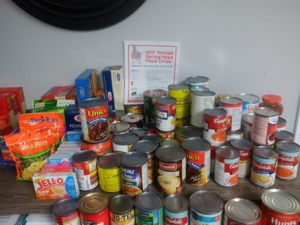 A close-up of the canned goods, jello and pasta collected