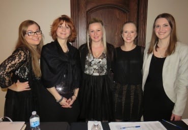 Five Skyliners take care of the registration desk at the Gala