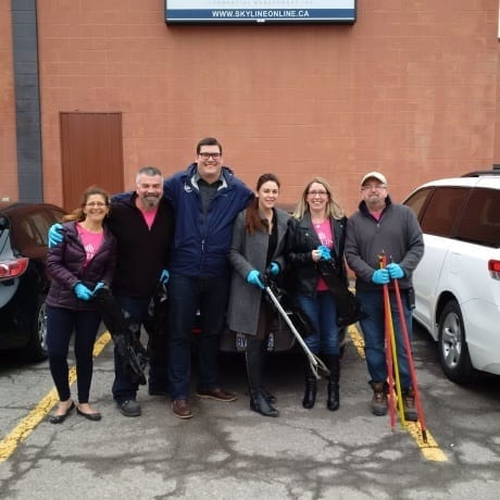 Six Skyline employees from Ottawa, Ontario collect garbage for Earth Day