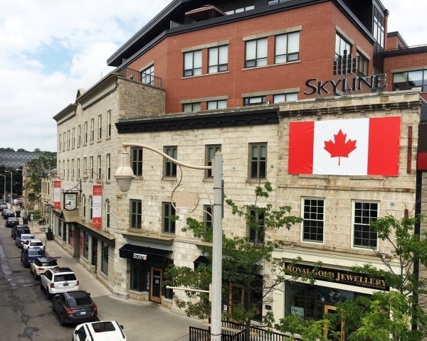 Large Canada flag hangs from Skyline's head office
