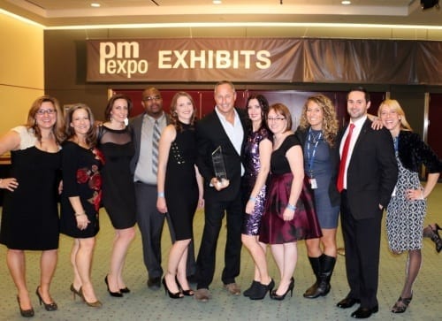 Eleven executives pose with the FRPO Award they won