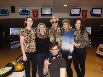 Six Skyliners dress in leopard print for theme charity bowling