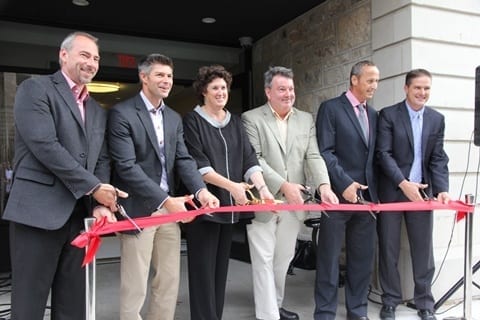 Skyline owners and Major Karen Farbridge cut the ribbon in front of the new head office