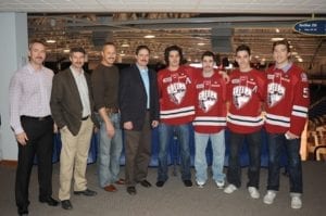 Skyline owners are pictured with four Guelph Storm team members in the Sleeman Center