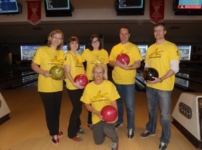 Six Skyliners dress in banana peel shirts for theme charity bowling